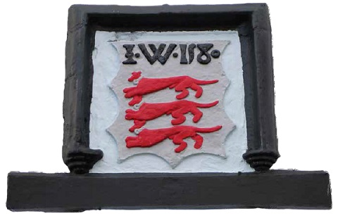 Coat of arms of de Whelpdales with datestone